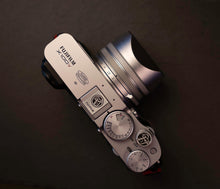 Load image into Gallery viewer, Silver Fuji Soft Release Button - Hyperion Handmade Camera Straps
