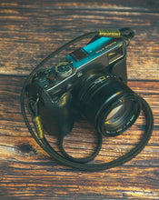 Load image into Gallery viewer, Real Pull-Up Waxed Leather Camera Strap - Black 10mm - Hyperion Handmade Camera Straps
