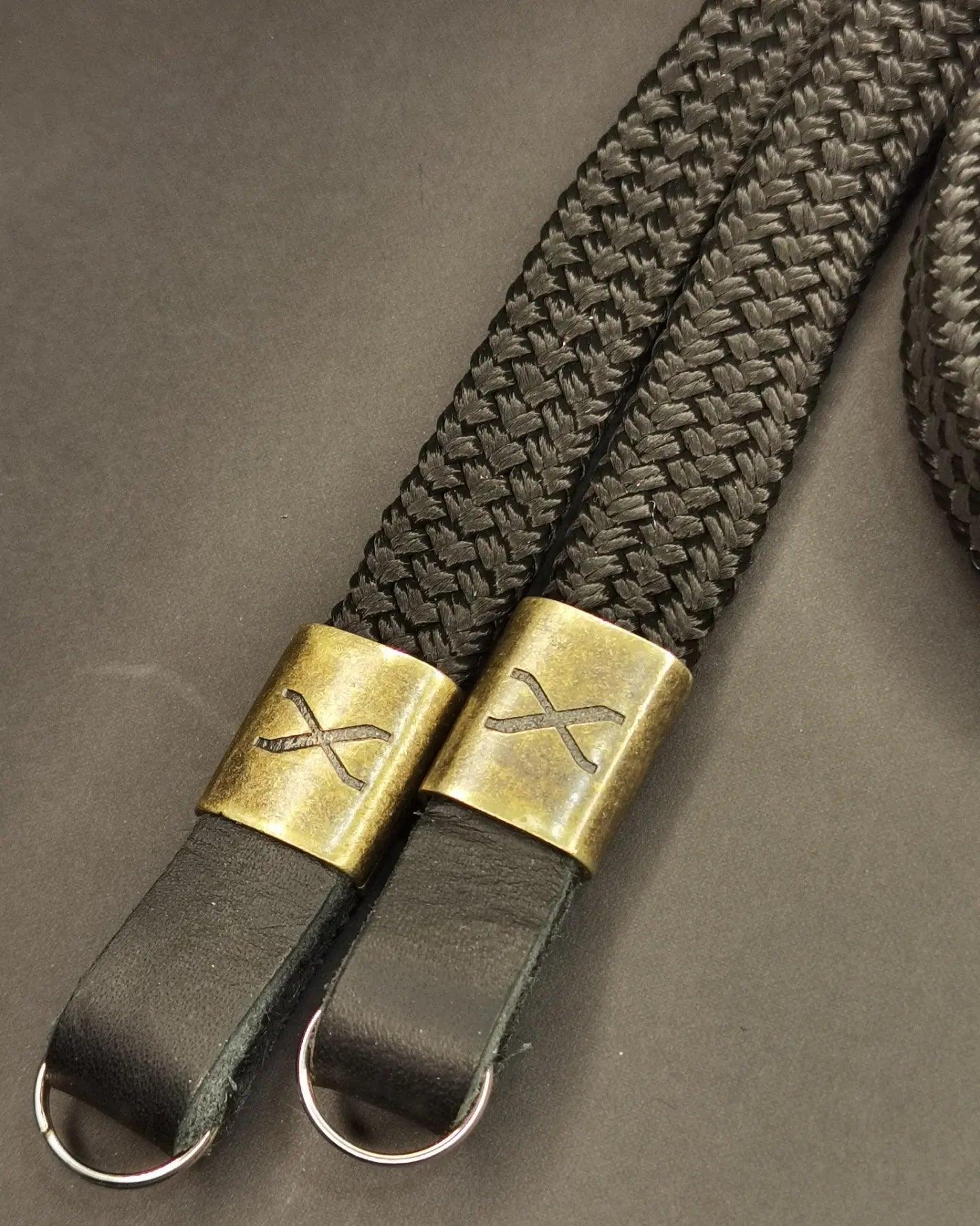 X Black Flat Rope Black Leather Camera Strap Bronze X Handmade Camera Straps Buy your personalized strap today. Hyperion Handmade Camera Straps